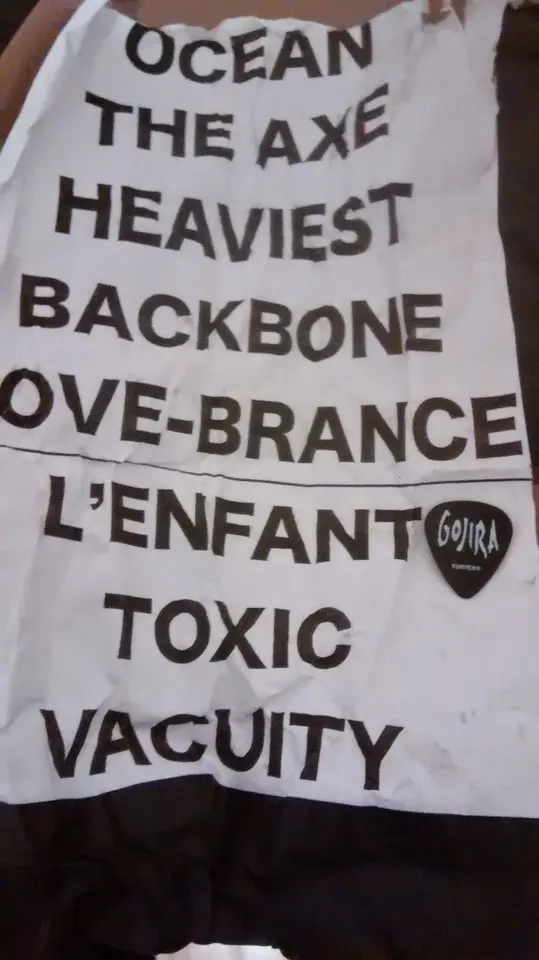 Setlist papier et médiator logo Gojira